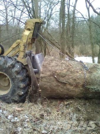 CAT 515 Skidder Kompaktlader
