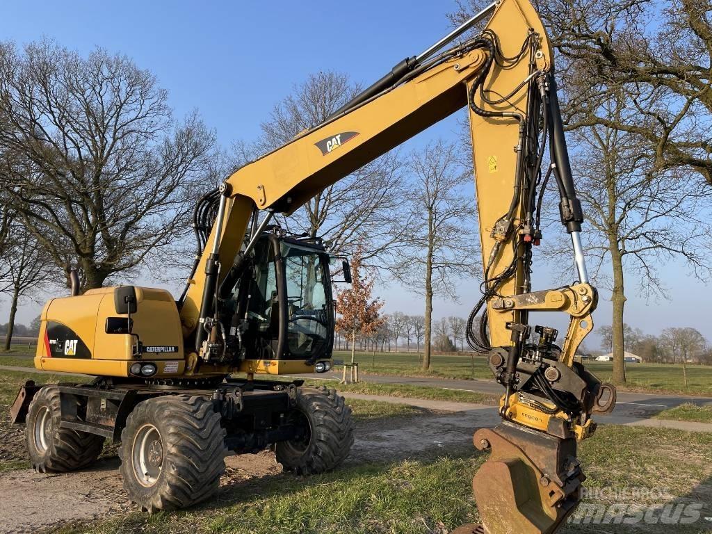 CAT M 313 D Mobilbagger