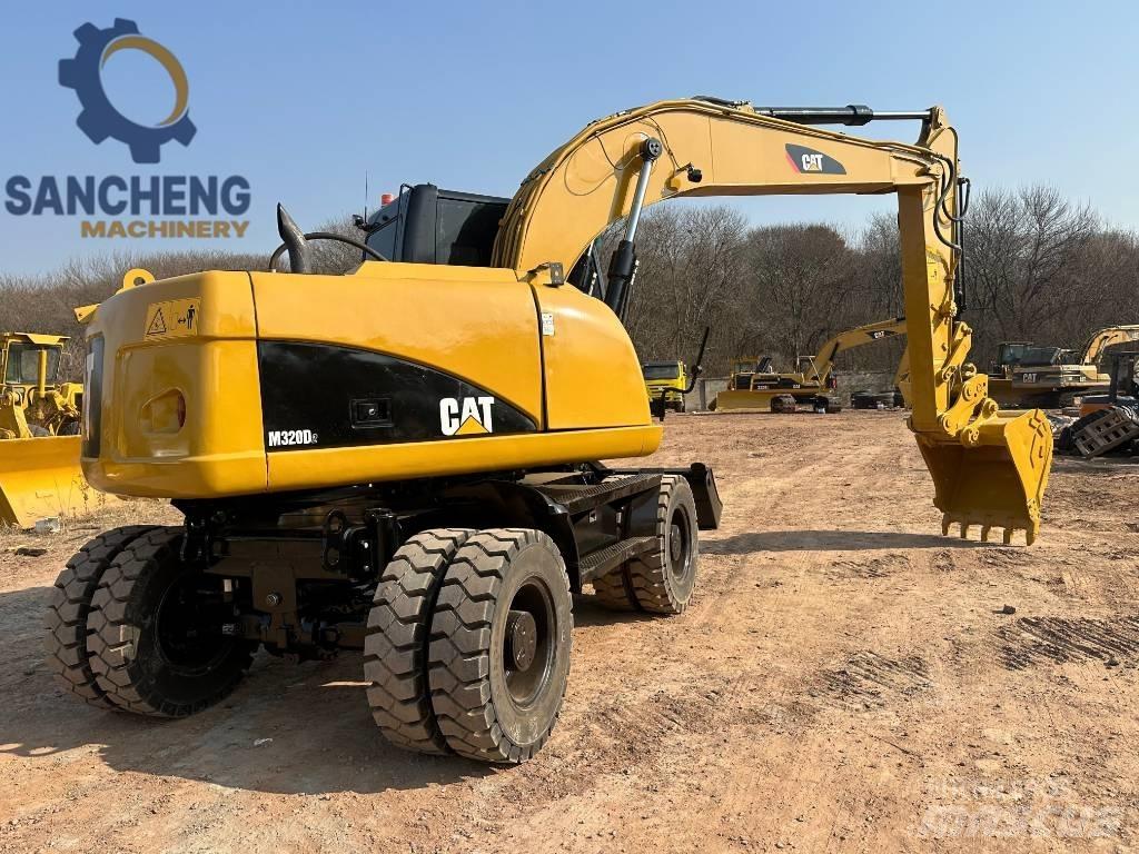 CAT M 320 D2 Mobilbagger