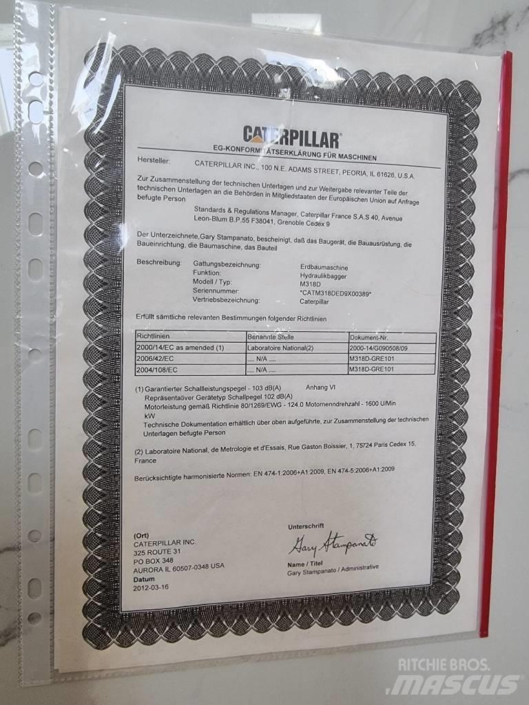 CAT 318D Materialumschlag