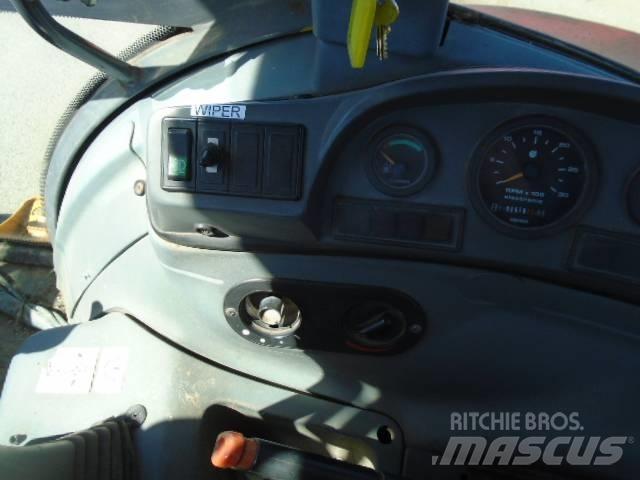 New Holland 575 E Baggerlader