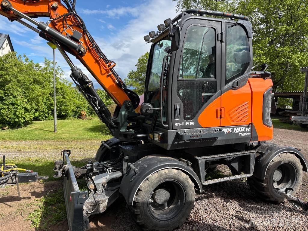 Develon DX 100 W-7 Mobilbagger