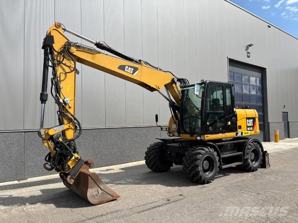 CAT M 313 D Mobilbagger