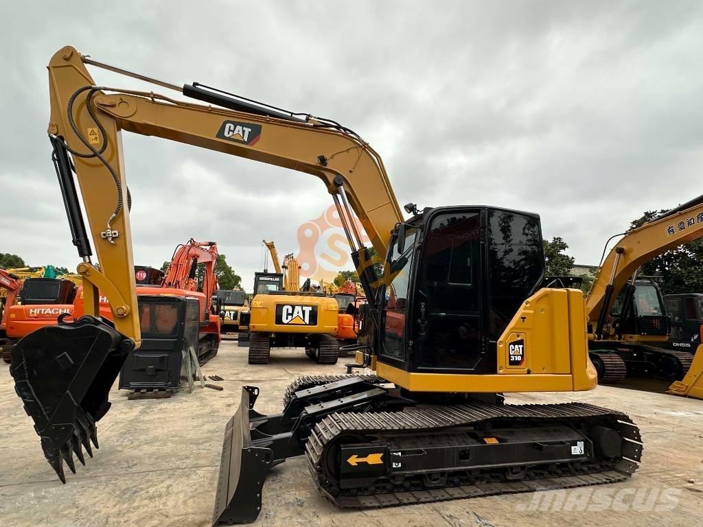 CAT 310 Raupenbagger