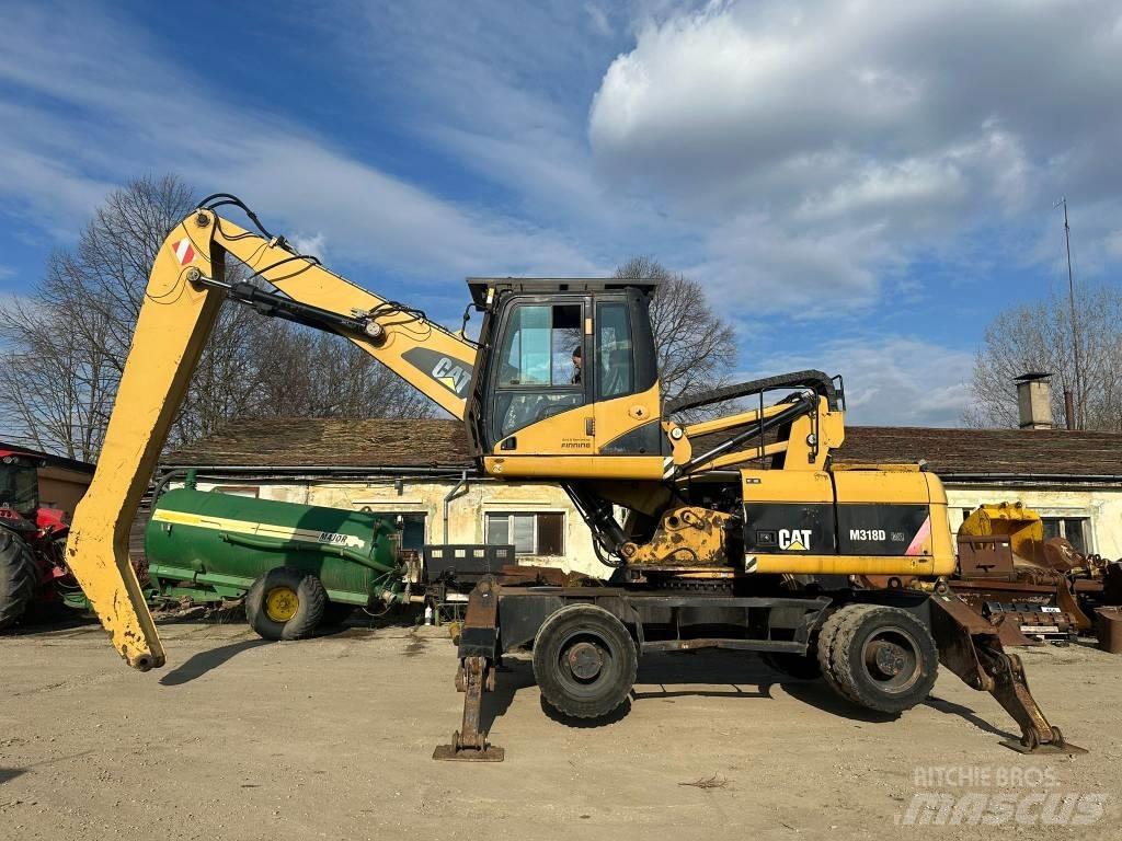 CAT M 318 D MH Materialumschlag