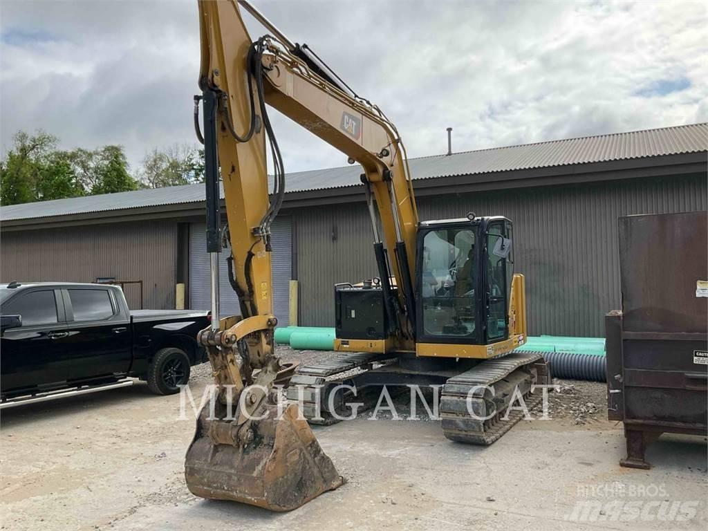 CAT 310 AQ Raupenbagger