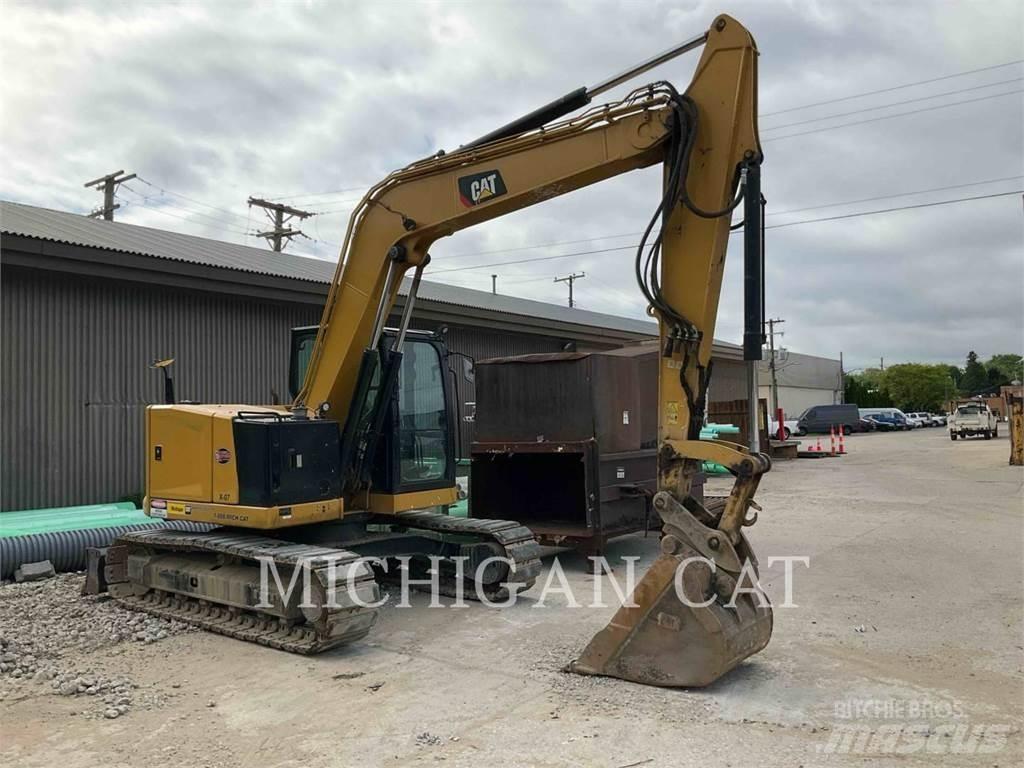 CAT 310 AQ Raupenbagger
