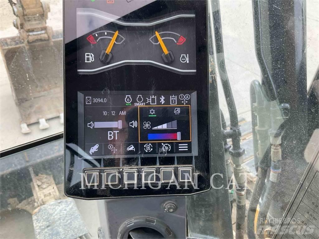 CAT 310 AQ Raupenbagger