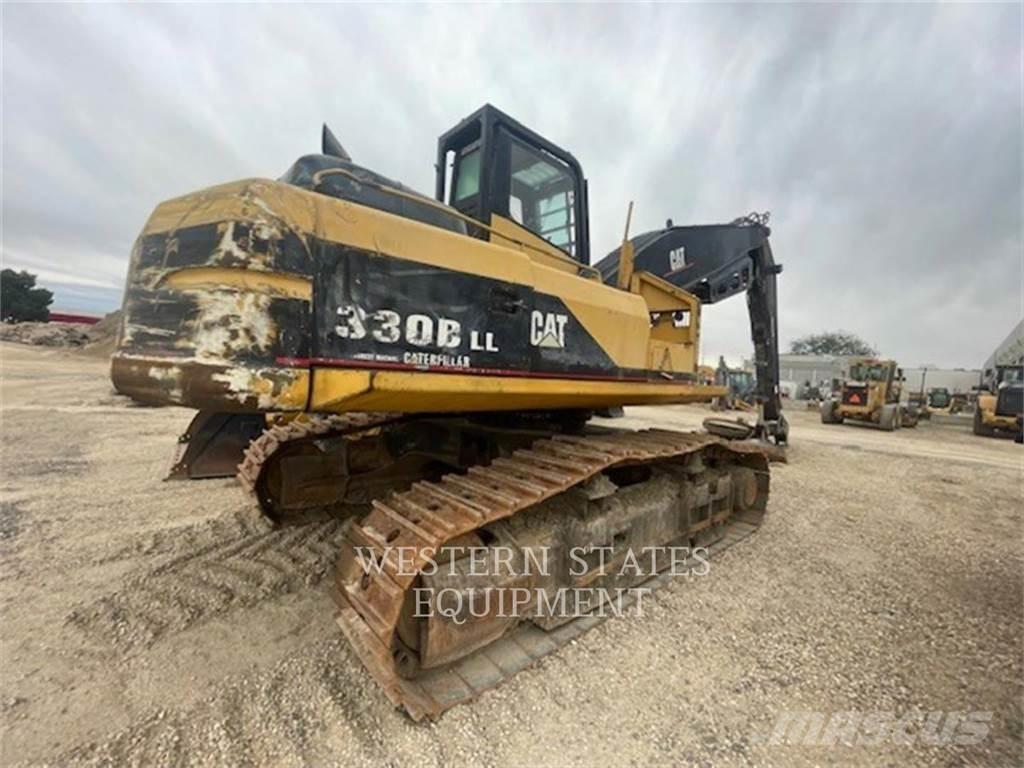 CAT 330B FM Forsttraktoren
