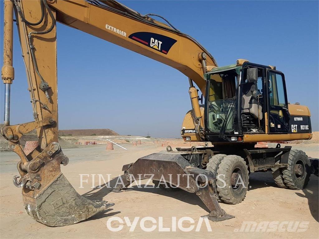 CAT M318 Mobilbagger