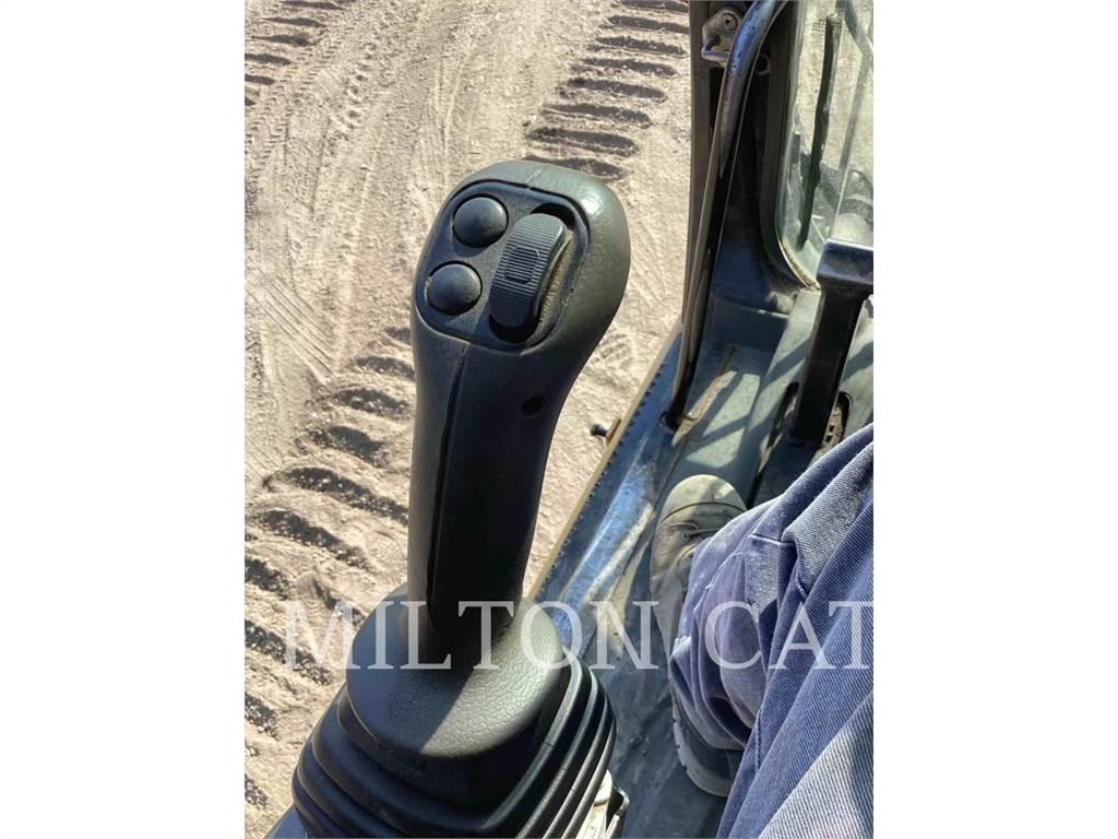 CAT M325D L MH Abrissbagger