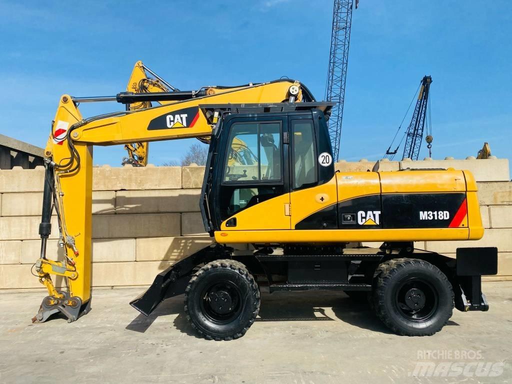CAT M 318 D Mobilbagger