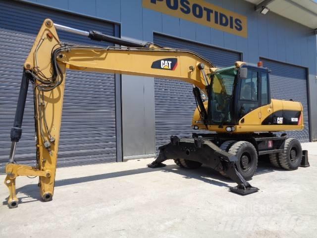 CAT M 318 D Mobilbagger