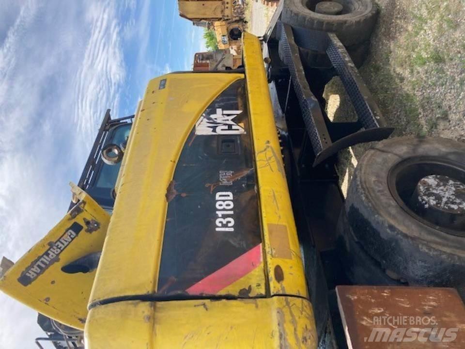 CAT M318D Kabinen