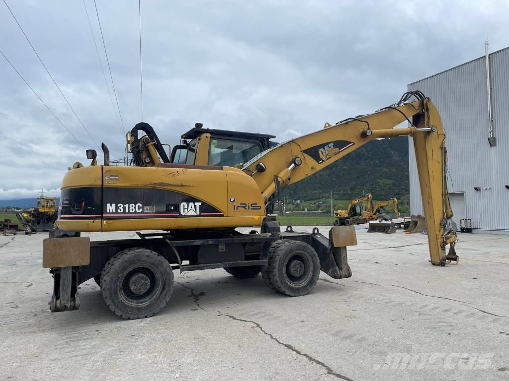 CAT M 318 C MH Materialumschlag