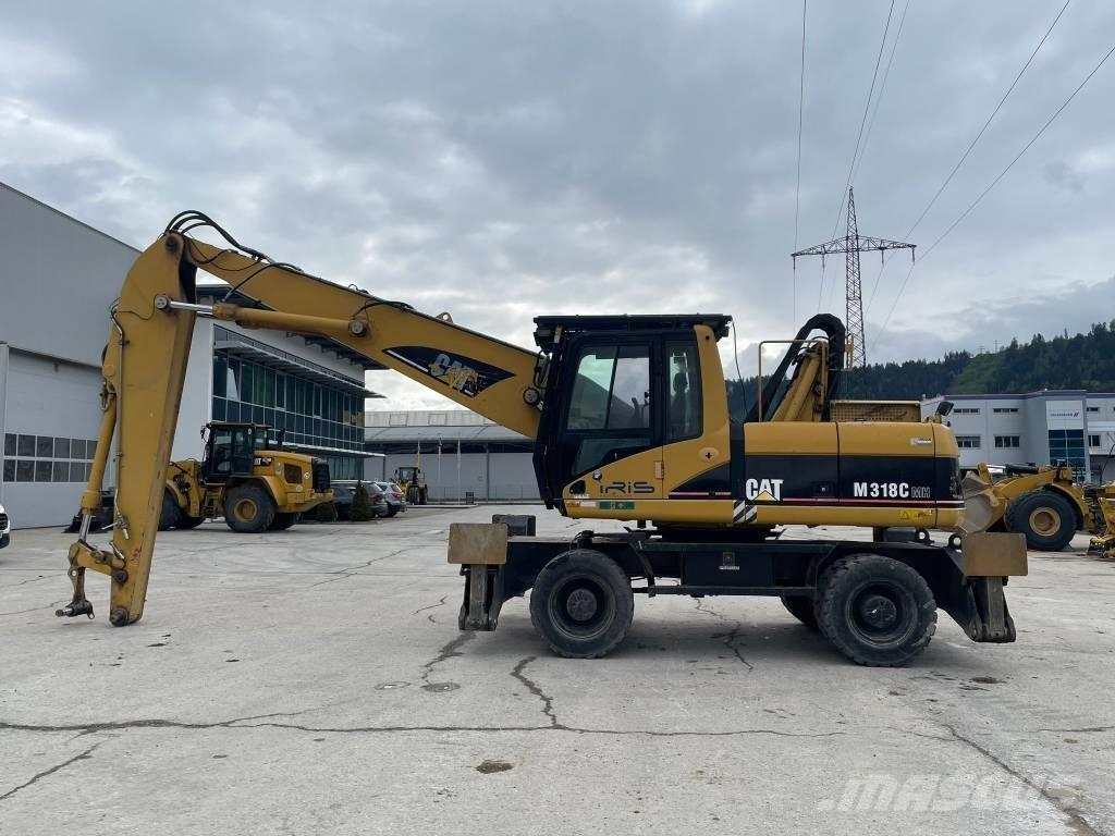 CAT M 318 C MH Materialumschlag