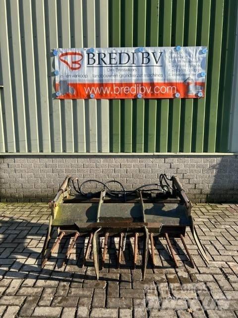 JCB Pelikan bak Schaufeln