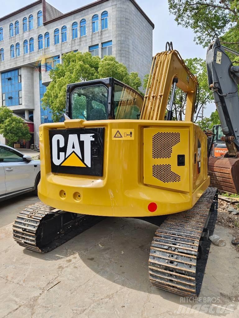 CAT 310 Raupenbagger
