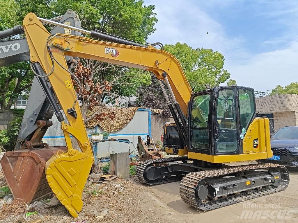 CAT 310 Raupenbagger