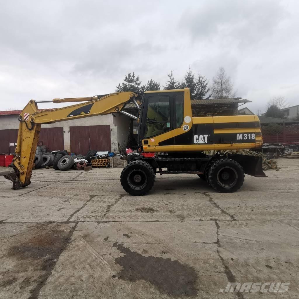 CAT M 318 B Mobilbagger