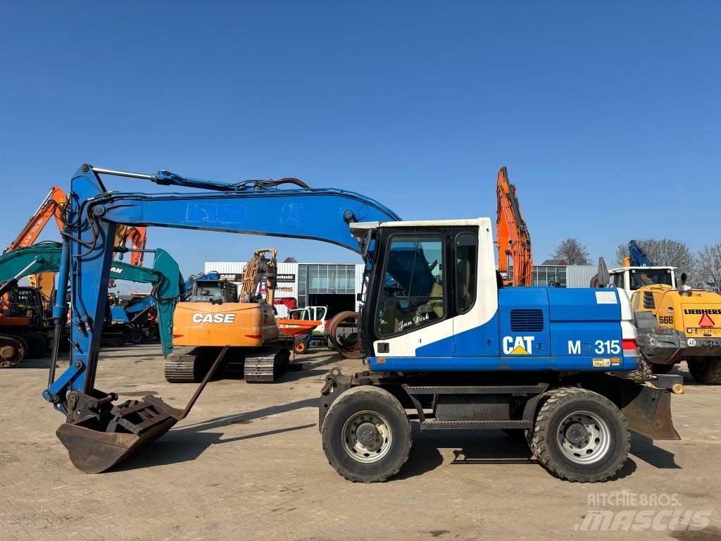 CAT M 315 Mobilbagger