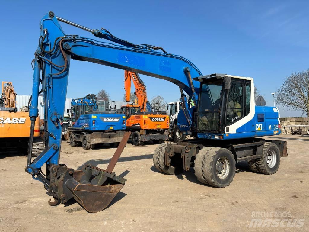 CAT M 315 Mobilbagger