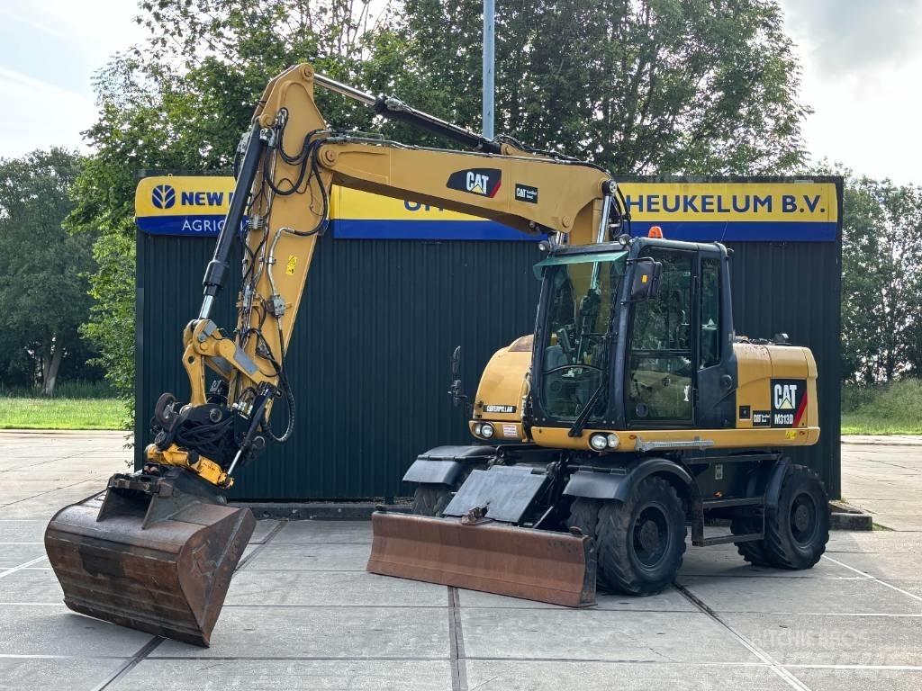 CAT M 313 D Mobilbagger