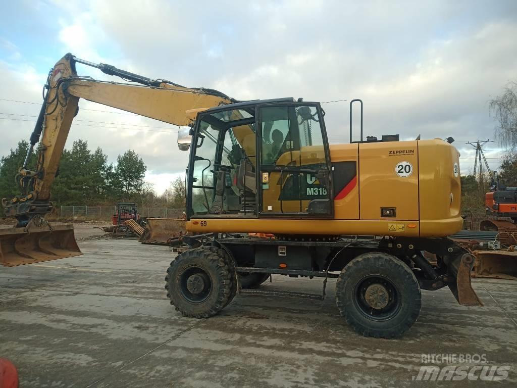 CAT M 318 F Mobilbagger
