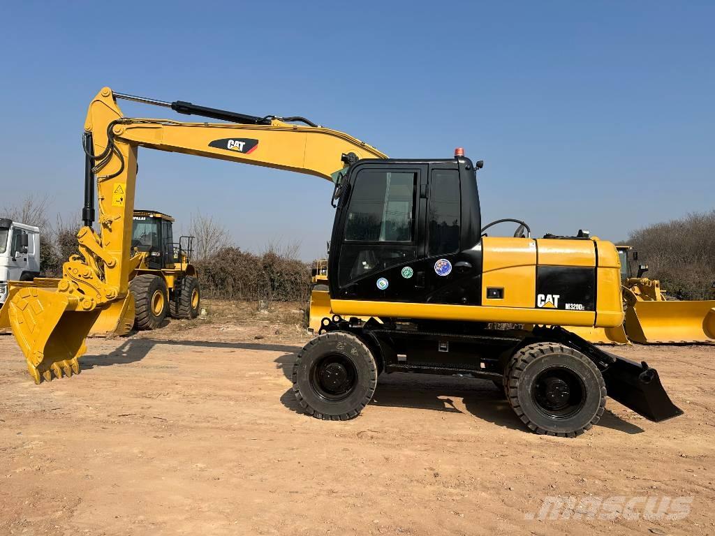 CAT M 320D Mobilbagger