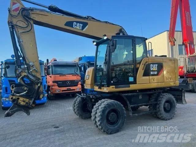 CAT M 318 F Mobilbagger