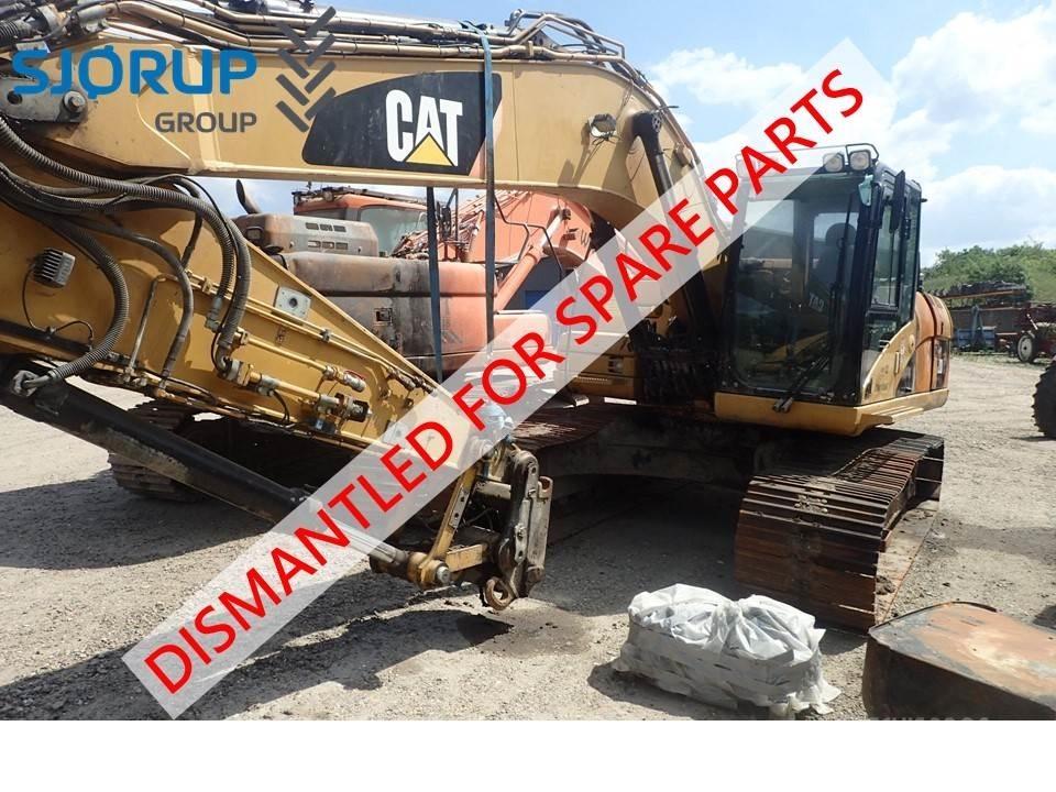 CAT 323D Traktoren