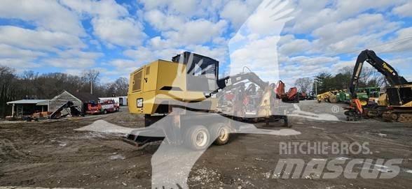 CAT 559C Gelenkausleger Lader