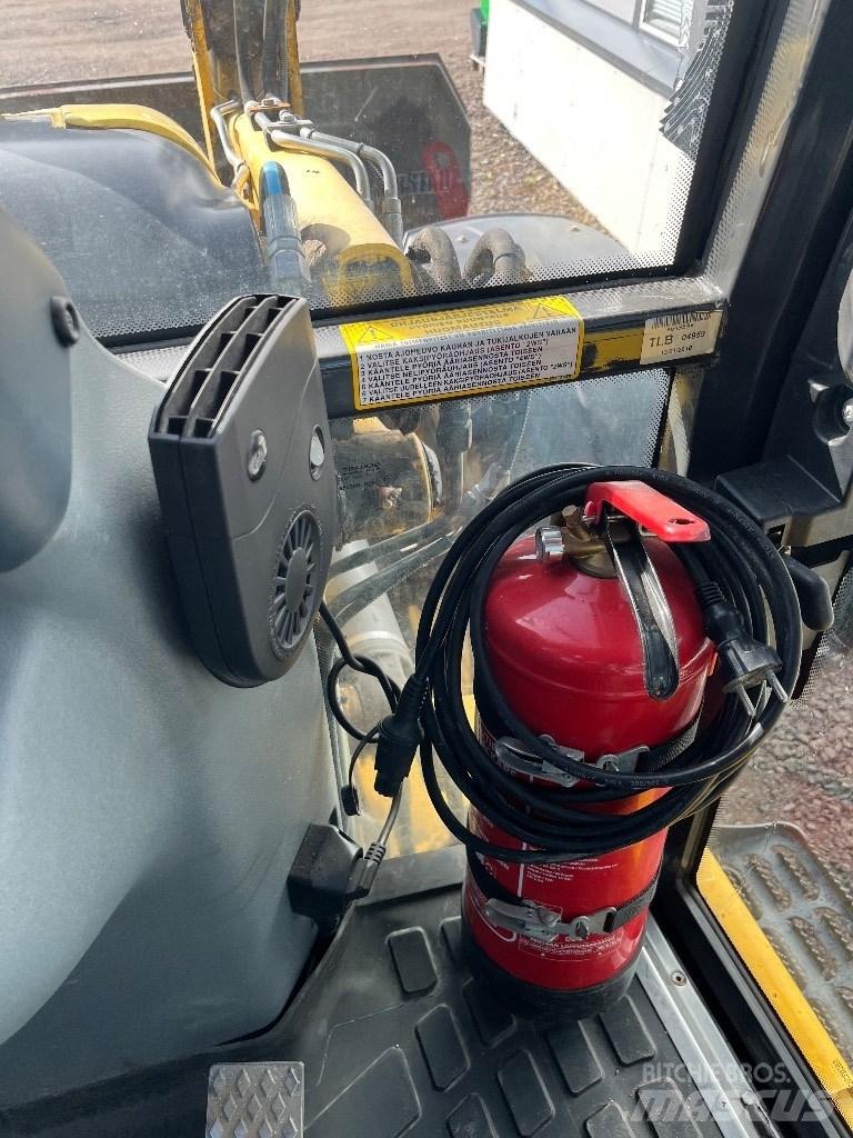 New Holland B 115 B Baggerlader