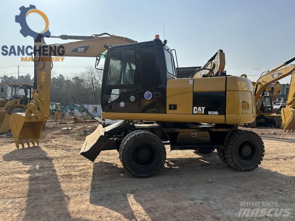 CAT M 320 D Mobilbagger