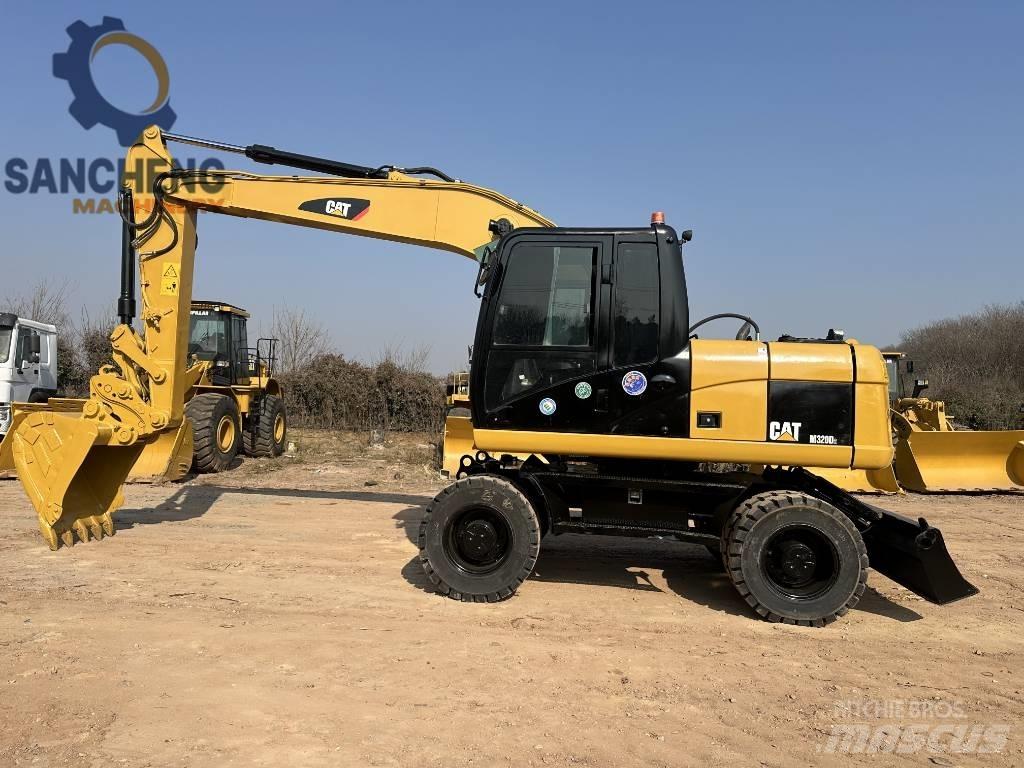 CAT M 320 D2 Mobilbagger