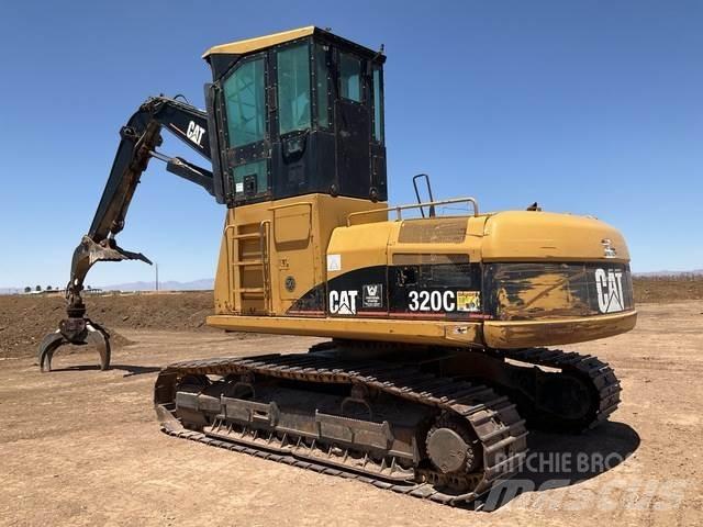 CAT 320C Gelenkausleger Lader
