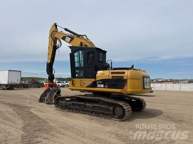 CAT 320DFM Holzspalter