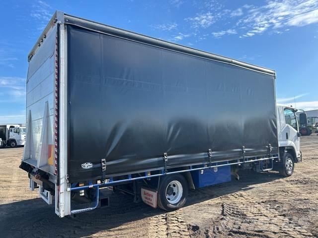 Isuzu FRR 600 Pritsche & Plane