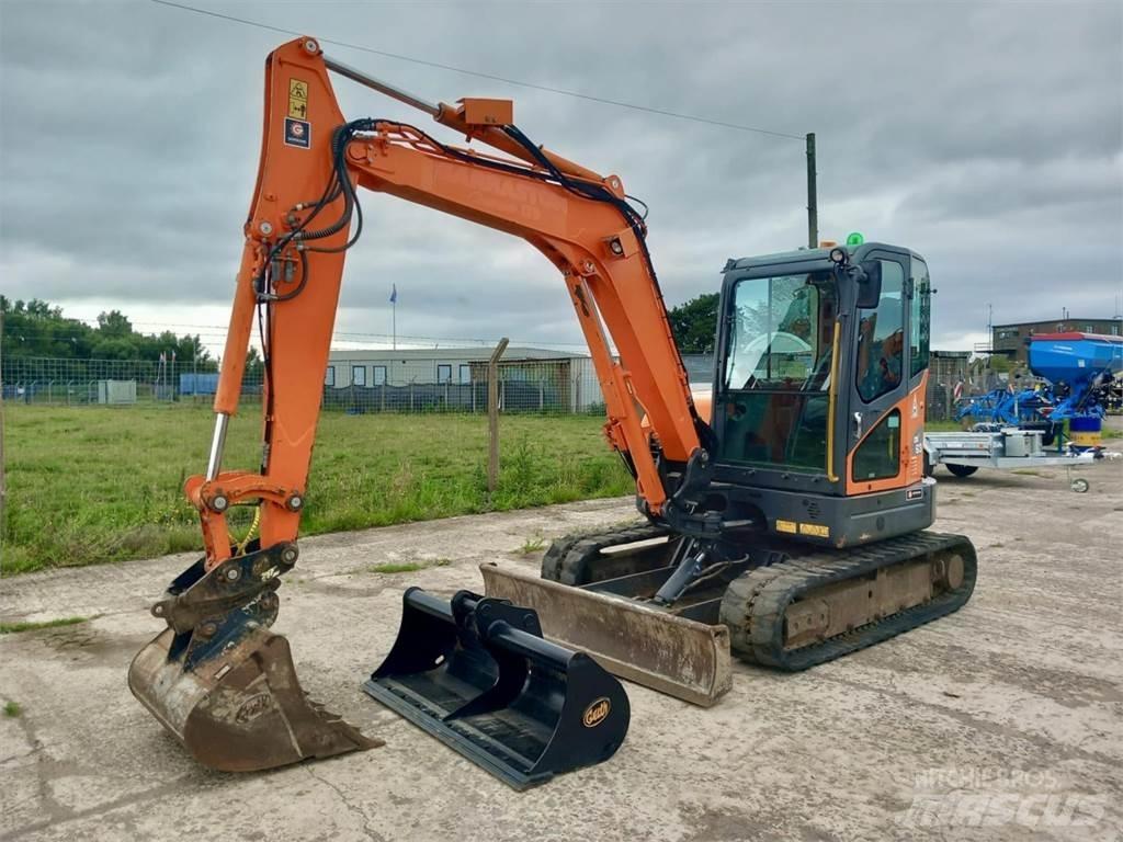 Develon DX63 Sonstige Landmaschinen