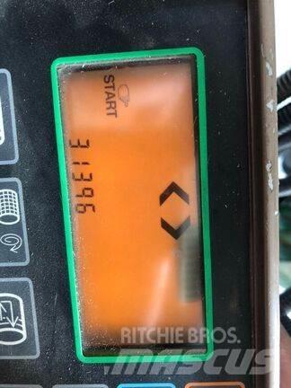 John Deere 590 Rundballenpressen