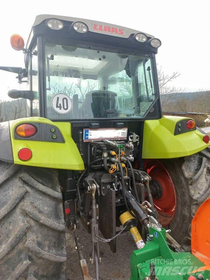 CLAAS Axos 330 CX Traktoren