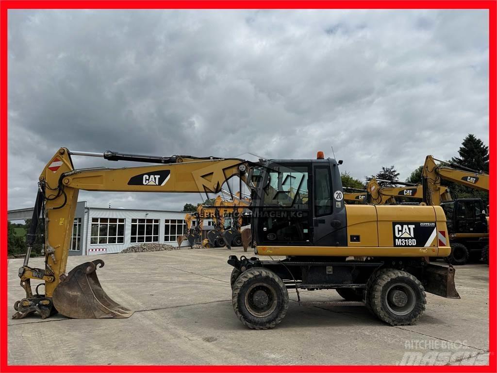 CAT M 318 D Mobilbagger