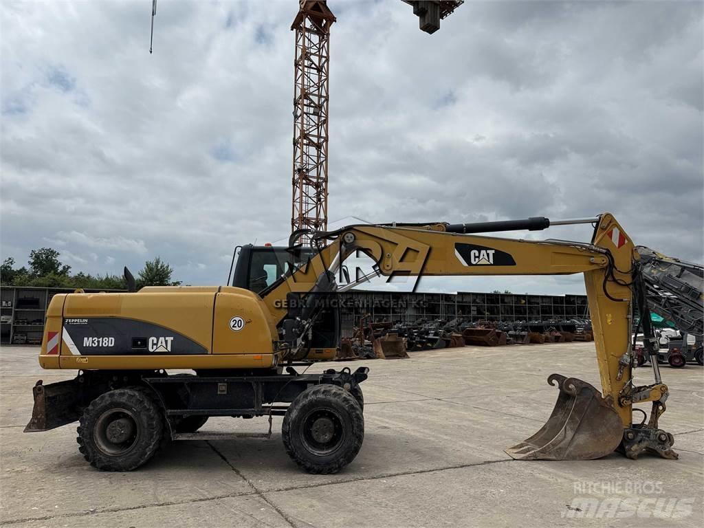 CAT M 318 D Mobilbagger