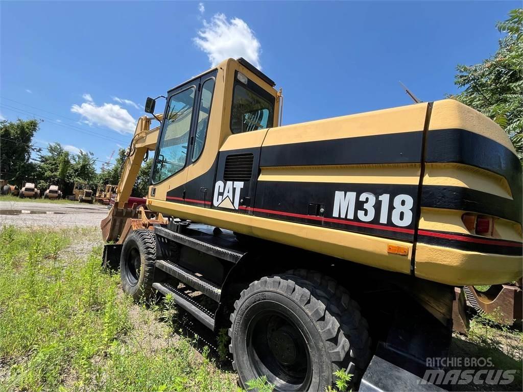 CAT M318 Mobilbagger