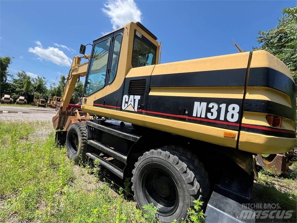 CAT M318 Mobilbagger
