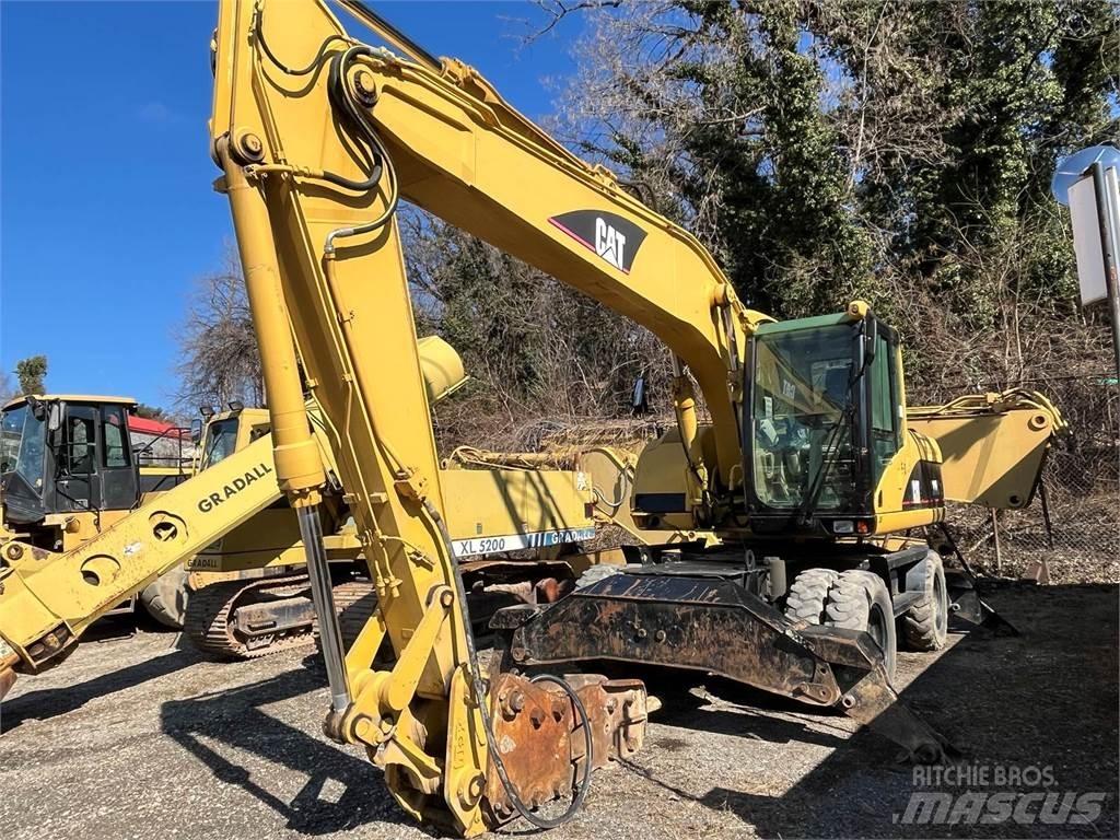 CAT M318C Mobilbagger