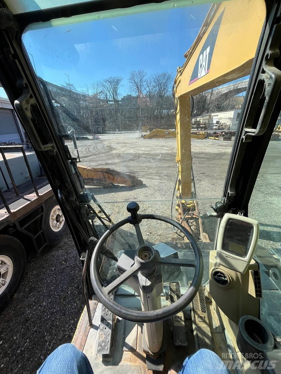 CAT M318C Mobilbagger