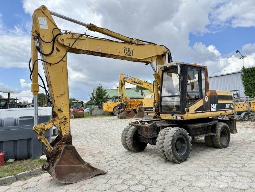 CAT M318 Mobilbagger