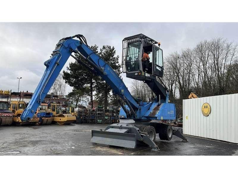 Fuchs MHL320 Materialumschlag