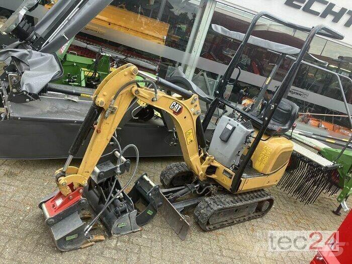 CAT 300.09D Mobilbagger